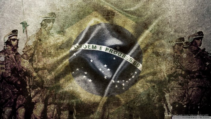 Soldiers in front of the Brazilian flag