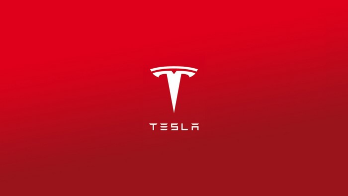 Tesla logo on red background