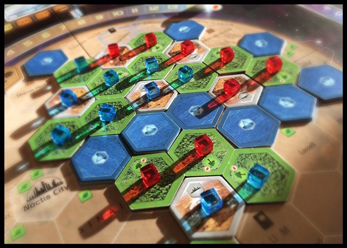 Terraforming Mars board game with red and blue cubes