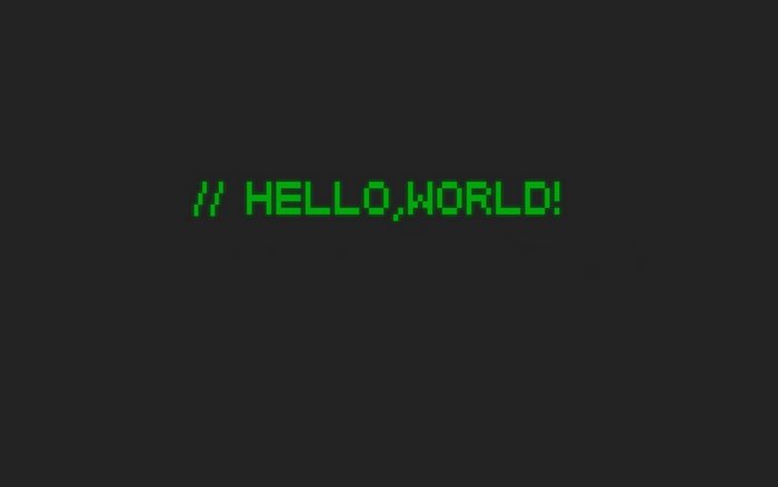Pixelated Hello World text on dark background