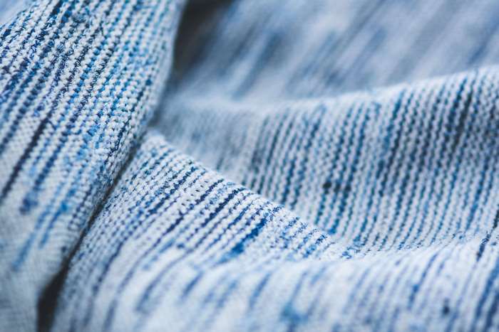 Close up of blue and white textured fabric