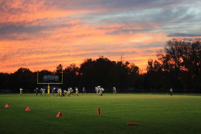 American Football Game at Sunset 4K