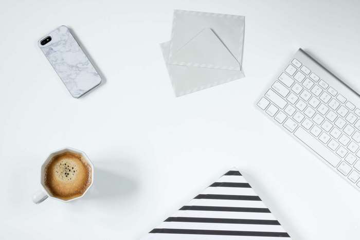 Marble iPhone, Coffee, Envelopes, Keyboard, and Striped Notebook