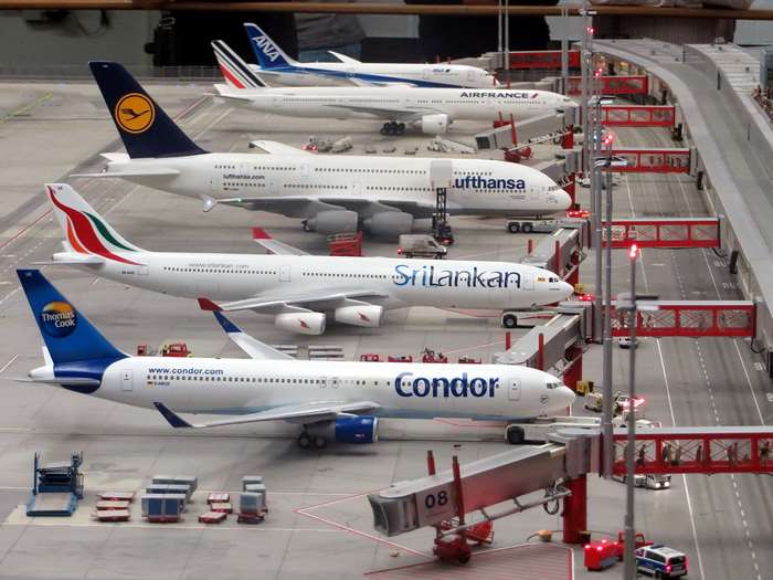 Model airport with Lufthansa, Air France, SriLankan, and Condor airplanes