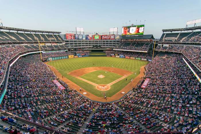 Baseball stadium with crowd and field