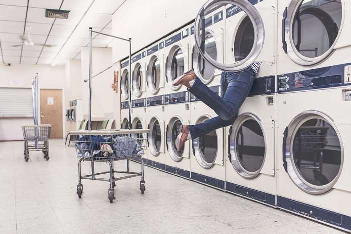 Woman stuck in washing machine at laundromat