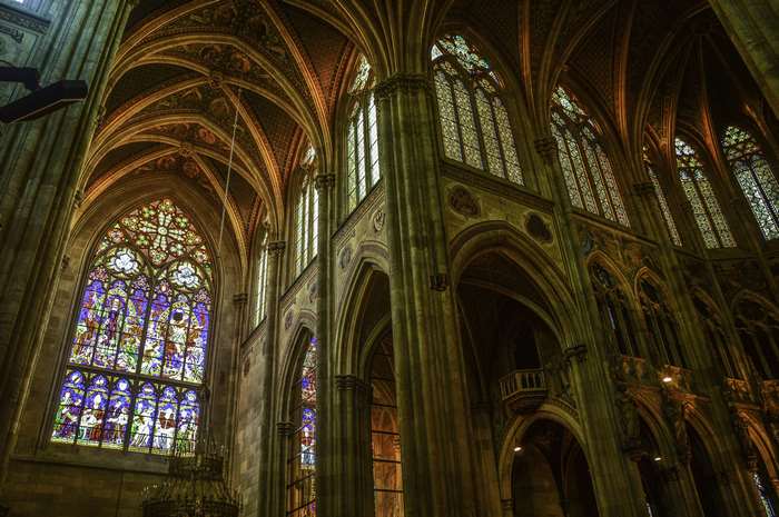 Interior of a Gothic cathedral with stained glass windows