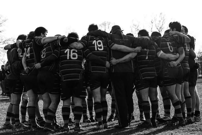 Rugby team in huddle