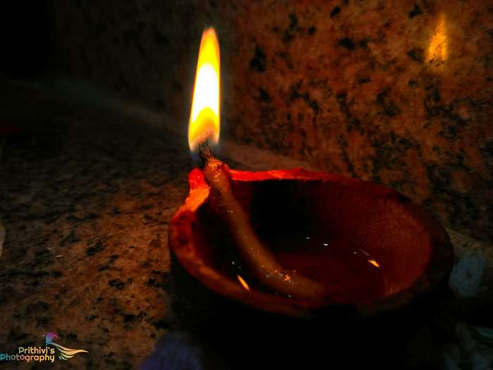 Diya lamp with flame in Tamil 4K