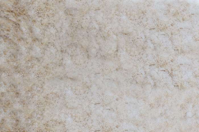 Close-up of a beige and brown mottled natural material