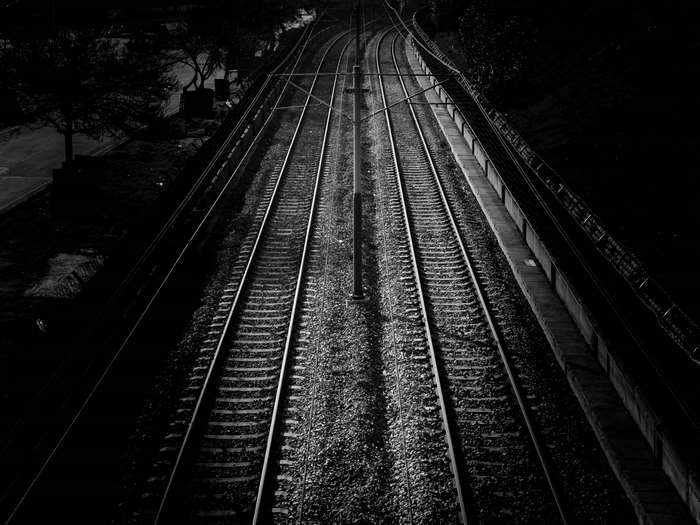 Black and white image of train tracks