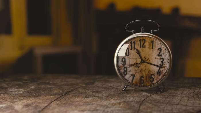 Alarm clock on a wooden table