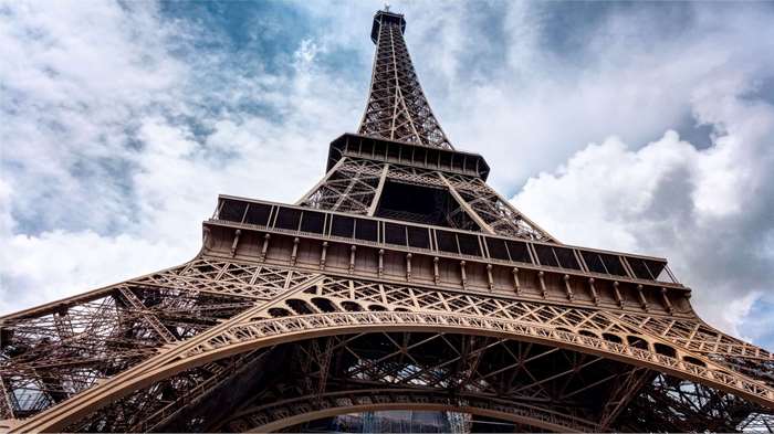 Eiffel Tower low angle shot with clouds