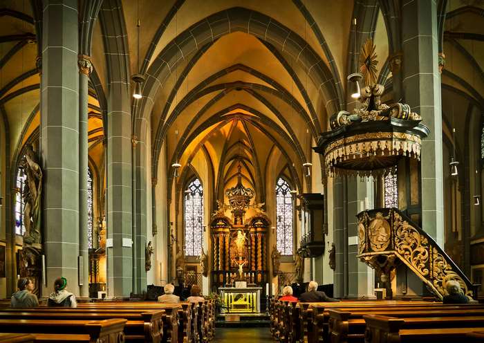 Interior view of a church with pews and altar