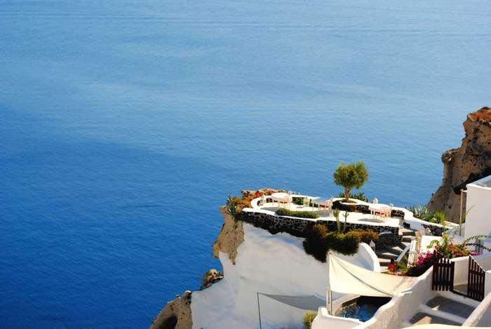Santorini Greece Cliffside Restaurant Overlooking the Aegean Sea