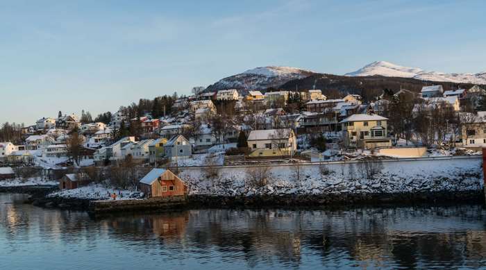 Tromso 4K panorama of snowy houses on a hill in Norway