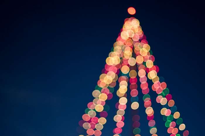 Bokeh Christmas Tree Lights on Dark Blue Background
