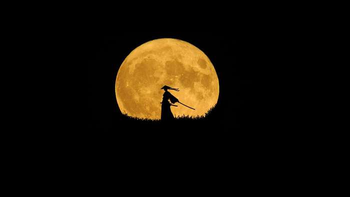 Samurai silhouette against a full moon