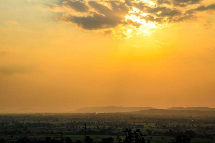 Golden sun over Indian countryside at sunset