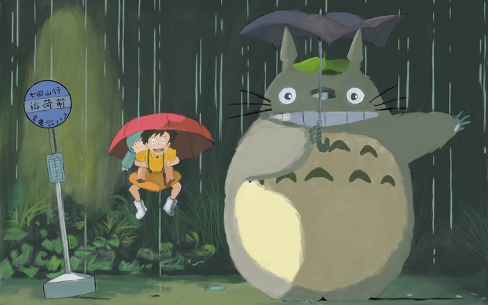 Totoro and children at a bus stop in the rain