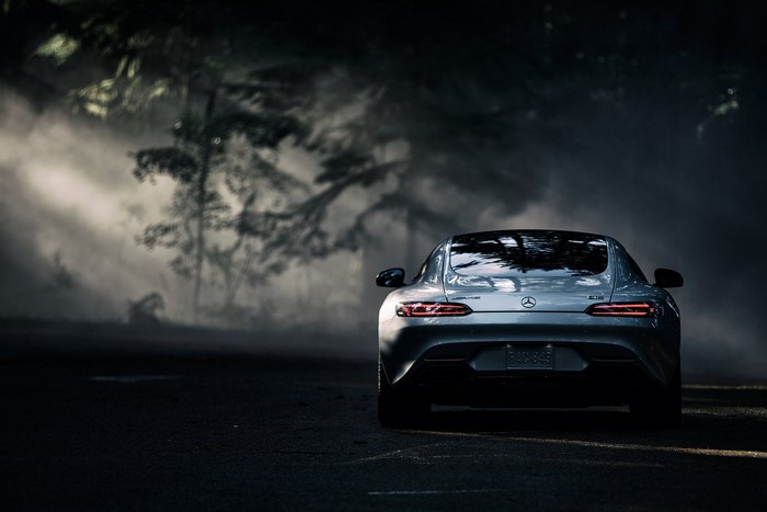 Mercedes-Benz AMG GT S rear view in foggy forest