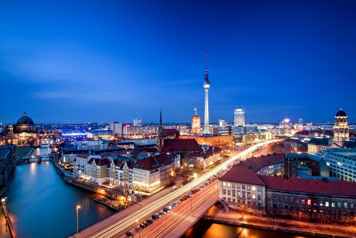 Berlin cityscape with TV Tower and Spree River at night