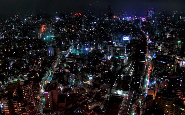 Night cityscape of Tokyo, Japan with illuminated skyscrapers