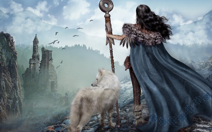 Warrior woman with wolf near mountain ruins