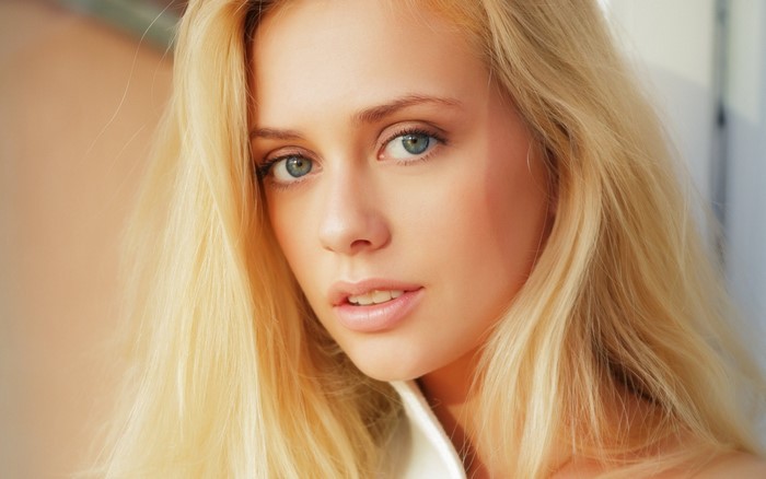 Portrait of a Blonde Blue-Eyed Girl