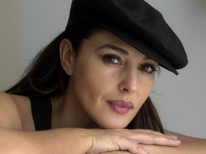 Monica Bellucci wearing a black cap