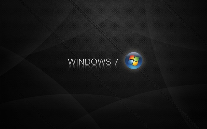Windows 7 logo on a black textured background