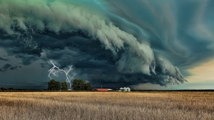 Stormy Sky with Lightning Over a Field
