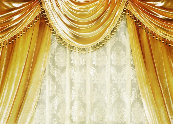 Gold velvet curtains with beaded trim and damask sheer curtains