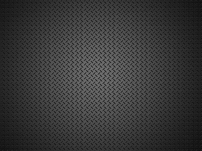 Dark textured metal plate with diamond pattern