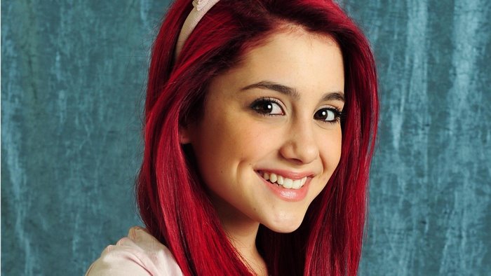 Ariana Grande with red hair and headband