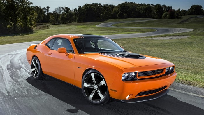 Orange Dodge Challenger on a Racetrack