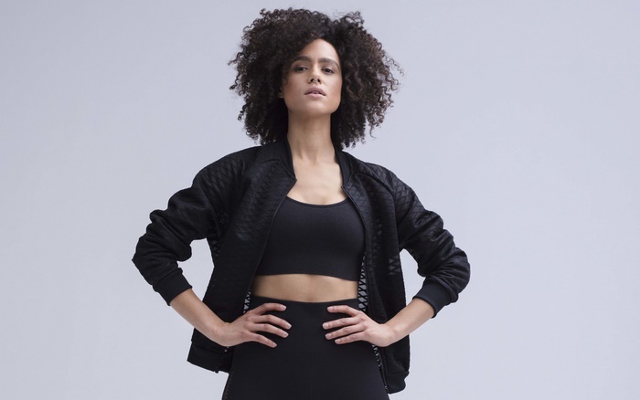 Nathalie Emmanuel in black athletic wear