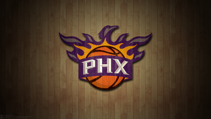 Phoenix Suns PHX logo on wood background