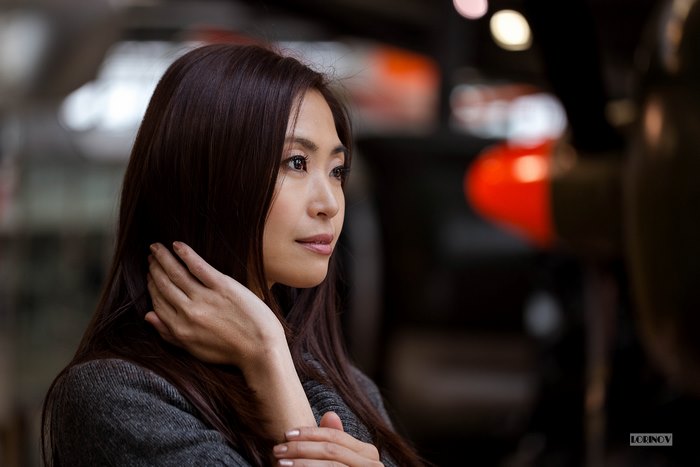 Asian woman with black hair and brown eyes