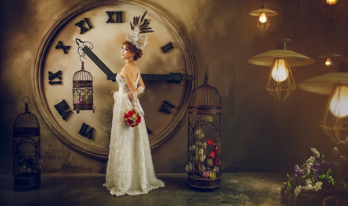 Elegant Woman in White Dress with Vintage Clock