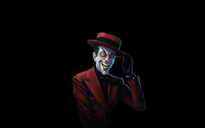 The Joker in a red suit and hat