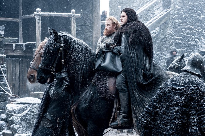Jon Snow and Tormund Giantsbane from Game of Thrones on horseback in snow