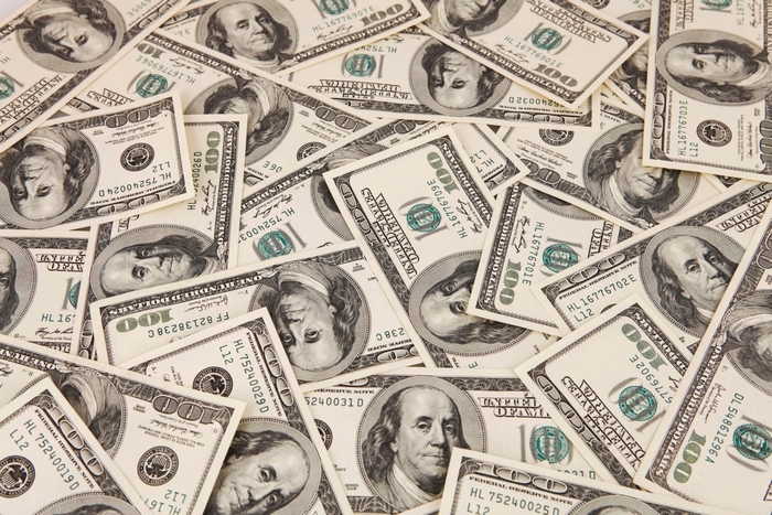 Pile of 100 Dollar Bills
