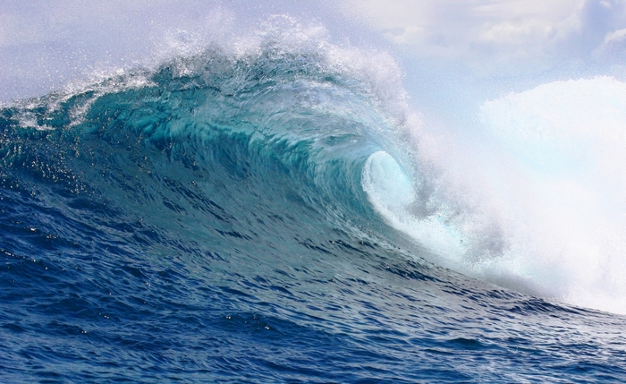 Ocean wave crashing with spray