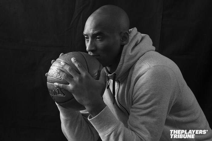 Kobe Bryant holding a basketball