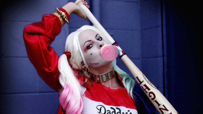 Harley Quinn with baseball bat and bubble gum