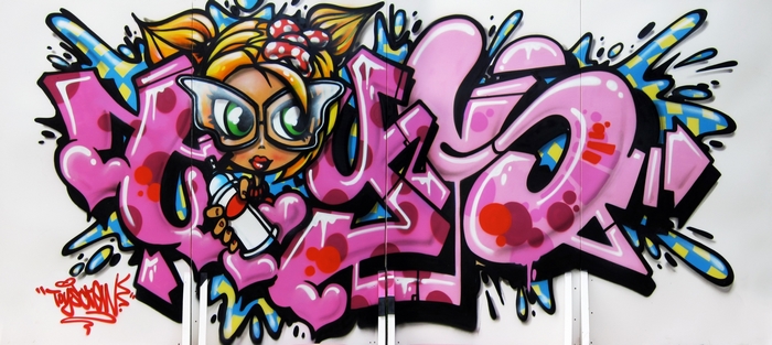 Graffiti art with cartoon character and pink lettering