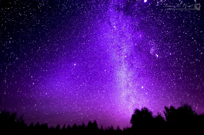 Vibrant Purple Galaxy with Starry Night Sky