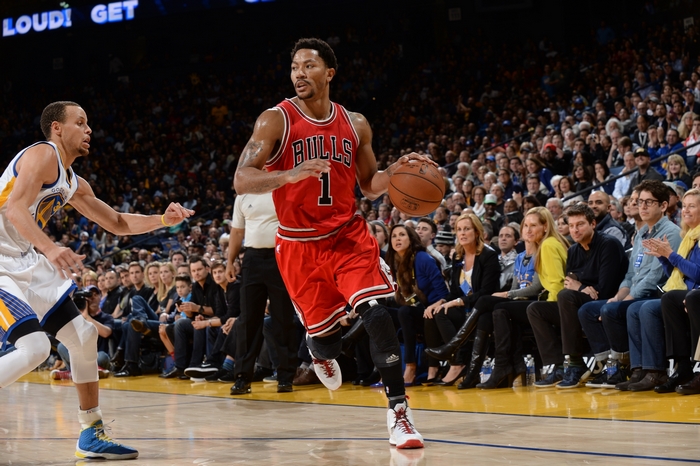 Derrick Rose and Stephen Curry playing basketball