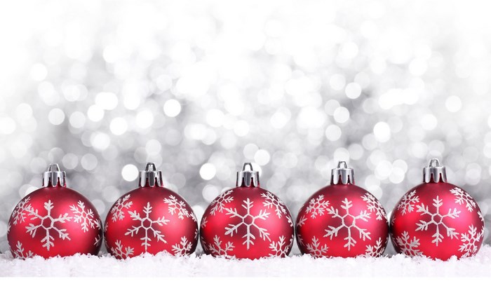 Red Christmas Ornaments with Snowflakes on Snow